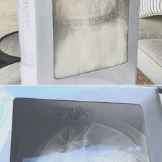 the wedding dress is in the box on the table