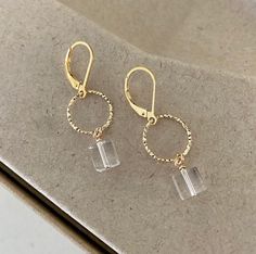 Gold Faceted Crystal Earrings For Gift, Elegant Gold Faceted Hoop Earrings, Clear Small Hoop Earrings Gift, Clear Small Hoop Jewelry For Gifts, Clear Small Hoop Jewelry Gift, Minimalist Gold Crystal Earrings, Gold Minimalist Crystal Earrings, Minimalist Gold Crystal Earrings With Ear Wire, Delicate Faceted Gold Earrings