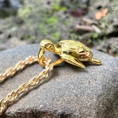 Need the perfect size Honu pendant with chain? We got you covered. Our Hawaiian Scroll Manini Turtle is perfect for men or women. Kids love it too! Choose Gold plated over .925 Sterling Silver with hand engraving on the shell of the turtle, includes beautiful 18" Gold-Filled rope chain --OR-- pick SILVER with silver rope 18" chain. Perfect size Honu! Hand Engraved Hawaiian Scroll Design Choose: Gold Plated over silver includes a Gold-Filled Rope 18 inch chain! OR -- SILVER with Sterling Silver 1 Turtle Pendant, Pendant With Chain, Scroll Design, Rope Chain, Hand Engraving, Gold Filled, Shells, Gold Plate, Plating