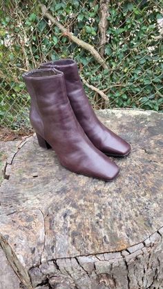 "Walk in style with these classic brown leather ankle boots  by Mister Shoes. With a confident 3\" inch and a fashionable square toe, you won't go unnotice! **Normal wear and tear** Length: 9 1/2\" Width: 3\" Height: 6\" Heel: 3\" Top: 10\" Color: Brown  Condition: Good Vintage  Brand: Mister Shoes" Formal Brown Mid-calf Boots With Square Toe, Classic Faux Leather Heeled Boots With Square Toe, Classic Square Toe Heeled Boots In Faux Leather, Classic Square Toe Faux Leather Heeled Boots, Fitted Brown Heeled Boots With Square Toe, Brown Mid-calf Boots With Square Toe, Wide Calf Brown Boots With Square Toe, Brown Wide Calf Boots With Square Toe, Brown Faux Leather Mid-calf Boots With Square Toe