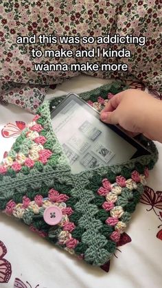 someone is crocheting a sweater with buttons on it and this was so adulting to make and i kinda wannan make more