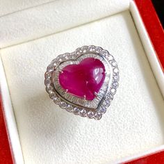 BRAND-NEW!! ONE OF A KIND, HANDCRAFTED RING. ENORMOUS & ELEGANT, 13.59 total carats weight, Certified, GORGEOUS, BURMESE RED RUBY ring. This ring offers an important statement of who you are with a GIGANTIC 10.82 carats, VIVID RED, Nearly TRANSPARENT, BURMESE RUBY. Accentuating the RUBY are the 82 E/VVS, and sparkling natural diamonds THE ITEM YOU SEE IN THE PICTURES IS THE EXACT ITEM YOU WILL GET! ONE OF A KIND, NO DUPLICATES OR TWINS SUGGESTED RETAIL VALUE: $32,500 RUBY: Weight: 10.82 cara Oval Ruby Ring In Platinum, Oval Ruby Ring In Platinum For Gift, Gia Certified Heart Diamond Rings, Gia Certified Heart Shaped Fine Jewelry Ring, Heart-shaped Gia Certified Ring For Anniversary, Gia Certified Heart-shaped Ring For Anniversary, Gia Certified Heart Shaped Anniversary Ring, Platinum Hallmarked Ruby Ring, Platinum Heart-shaped Fine Jewelry Rings