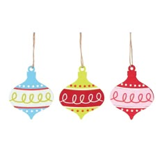 three ornaments hanging from strings on a white background