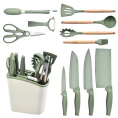 the kitchen utensils are arranged neatly in a container, including knives and spatulas