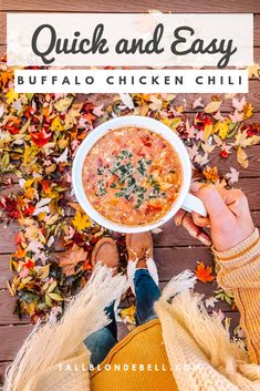 a person holding a bowl of buffalo chicken chili in front of fall leaves with text overlay that reads quick and easy buffalo chicken chili