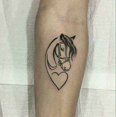 a horse with a heart tattoo on its leg