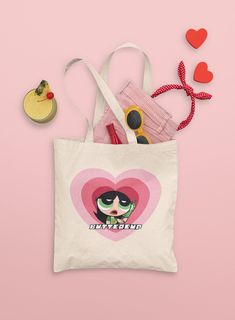 "y2k Powerpuff Girls Buttercup Canvas Tote Bag , these cute and aesthetic cotton tote bags are very trendy and practical for everyday use. They make a great shopping , picnic , beach bag , or as an everyday fashion accessory, and makes a great gift for friends and family. ★ 100% cotton Canvas ★ One size  ★ Heavy fabric  ★ Measuring at 16\"h x 15\"w and with a handle length of 20\" ★ Reinforced handle stitching ★ Sustainable, practical and durable ★ Please note : White space does not print ★ Tote bag handle is shorter than displaced in pictures, please refer to size above." Y2k Powerpuff, Aesthetic Powerpuff, Y2k Style Aesthetic, Powerpuff Girls Buttercup, Totes Ideas, Heart Tote Bag, Picnic Beach, Girls Tote, Trendy Tote Bags