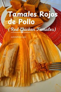 tamales rojos de pollo red chicken tamales on a white plate