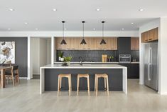 the kitchen is clean and ready to be used as a dining room or living room