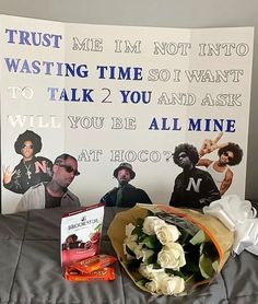 a bouquet of white roses sitting on top of a bed next to a sign that says trust me i'm not into washing time so i want to talk 2 you and ask will you be all mine