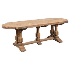 an old wooden table with two legs and a large slab on the top, against a white background