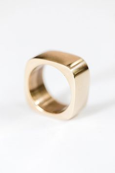 Wear this brass square rings alone, in multiples, or stacked with others. Handcrafted by artisans in Kenya earning a living wage. Lotion And Perfume, Mc Bling, Minimal Ring, Square Ring, Spiral Earrings, Square Rings, Cloth Bag, Handmade Rings, Sustainable Jewelry