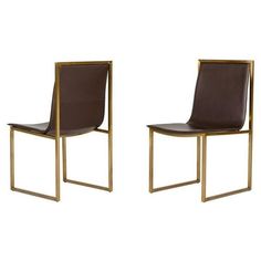 two brown leather chairs with gold metal legs and backrests, one in the shape of a rectangle