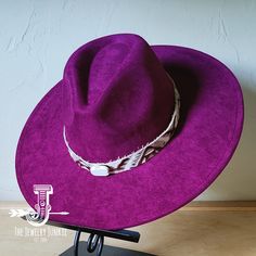 If you’re looking for the perfect accessory to complement your favorite boho style, look no further. The Boho-Style Western Felt Hat w/ Embossed Leather Hat Band by The Jewelry Junkie is absolutely everything that you need. Not only is it easy to incorporate into any and all outfits, but the genuine leather of the band immediately elevates whatever it is you’re wearing. Match your one-of-a-kind hat with any one of the matching accessories that we have for a completely gorgeous look. One Size Hat Purple Adjustable Flat Brim Felt Hat, Adjustable Flat Brim Purple Felt Hat, Adjustable Purple Felt Hat With Flat Brim, Adjustable Western Purple Hat, Handmade Bohemian Felt Hat For Rodeo, Bohemian Brimmed Felt Hat For Country Events, Bohemian Fedora For Country Events, Turquoise Bohemian Hat For Western-themed Events, Bohemian Flat Brim Felt Hat For Festival