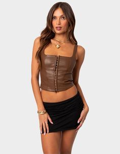 This Faux Leather Corset Is The Perfect Choice For A Night Out With The Girls. Its Flattering Fit And Hook & Eye Front Closure Ensure You Feel Secure While You Dance All Night. Corset. Square Neckline. Hook & Eye Front Closure. 50% Polyurethane, 50% Rayon. Model Wears Size S. Model Height Is 5'8. Item Care: Hand Wash. | Edikted Simone Faux Leather Corset Modern Corset, Leather Corset Top, Visionary Fashion, Dance All Night, Leather Corset, Swimwear Dress, Hook Eye, Corset Top, S Models