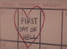 a heart with the words first day of hell written on it in front of a calendar