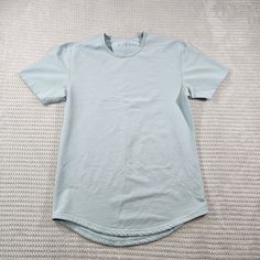 Bylt Tshirt Mens Small Short Sleeve Curved Hem Light Blue. Good Used Condition ~ Super-Fast Shipping, Ships The Same Or Next Business Day! ~ All Items Come From A Smoke Free Home. ~ Willing To Offer Bundle Discounts And Combined Shipping. ~ All Clothing Items Are Washed Unless New With Tags. ~ All Clothing Items Are Sealed After Photographs. ~ Measurements Are Provided To Ensure Fit, See Photos! ~ Please Feel Free To Ask Any Questions You May Have. ~ If You Are Unhappy With Your Purchase, Please Feel Free To Reach Out We Will Resolve Any Issues. ~All Items Are Cross Posted. Basic Light Wash Cotton Tops, Basic Light Wash Crew Neck T-shirt, Light Wash Cotton Shirt For Streetwear, Light Blue Short Sleeve Plain Tops, Light Blue Plain Crew Neck Top, Light Blue Cotton Streetwear Tops, Light Blue Short Sleeve Shirt For Streetwear, Casual Light Blue Plain T-shirt, Light Blue Shorts