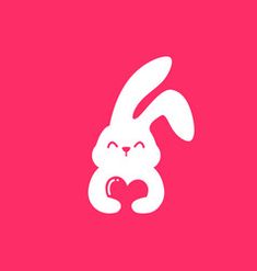 a white rabbit holding a heart on a pink background