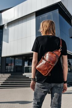 Item description. What would you call it at a first sight, a bag or a backpack? It's at once a bag, a backpack and something in between! Relatively small in size, but very spacious and practical. Zip-fasteners make it look more modern and dynamical. Zip pocket on the front wall : 8.3 x 6.7 in / 21 x 17 cm Inside pocket on the back wall : 6.7x5.5 in / 17 x 14 cm Adjustable Strap 43.3 in / 110 cm. It is fixed on carbines which can be fastened to the left or right side Size : 12.2 x 8.7 x 2 in 31 x Casual Brown Satchel For Everyday Use, Brown Leather Crossbody Backpack For Everyday, Brown Shoulder Bag Backpack For Everyday Carry, Brown Satchel Chest Bag For School, Brown Everyday Backpack, Casual Brown Backpack For Everyday Carry, Brown Backpack For Everyday Carry, Casual Shoulder Bag For Everyday Carry, Brown Waxed Finish Shoulder Backpack