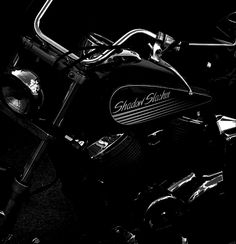 a black and white photo of a motorcycle