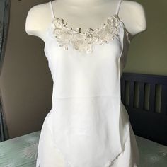 Sleepwear Tank & Short Set. Lacing Tie At Back. White Sleepwear With Built-in Bra For Spring, White Camisole For Sleep In Spring, White Spring Camisole For Sleep, White Camisole For Spring Sleepwear, White Feminine Tank Top For Loungewear, Sheer White Loungewear Tops, Elegant White Tank Top For Loungewear, White Sheer Tops For Loungewear, Elegant White Stretch Sleepwear