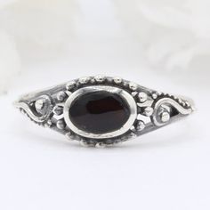 Item Specifications: Face Height: 7 mm Finish: Oxidized Stone: Black Agate Metal Material: Sterling Silver Custom orders welcome! Elegant Silver Stackable Oval Rings, Oval Shape Ring, Black Stone Ring, Silver Gift Wrap, Special Ring, Ring Black, Black Agate, Silver Gifts, Gothic Jewelry