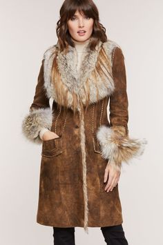 Georgia Distressed Lambskin Leather Coat with Coyote Fur Trim | Overland Luxury Fur Coat With Feather Trim For Winter, Luxury Winter Fur Coat With Feather Trim, Luxury Fall Fur Coat With Faux Fur Trim, Luxury Fur Coat With Faux Fur Trim For Fall, Luxury Fur Coat With Feather Trim For Fall, Luxury Feather-trimmed Fur Coat For Fall, Designer Leather Fur Coat With Faux Fur Lining, Designer Sheepskin Fur Coat With Faux Fur Lining, Luxury Sheepskin Fur Coat With Faux Fur Trim