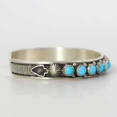 Sterling Silver Cuff Bracelet with Natural Kingman Turquoise from Arizona and Hand-Stamped Designs. .25” Cuff Width5.625” Inside Measurement, plus 1” opening(6.625" Total Circumference - Medium) Turquoise Stamped Cuff Bangle Bracelet, Turquoise Stamped Cuff Bracelet Bangle, Zuni Jewelry, Concho Belt, Navajo Jewelry, Southwestern Jewelry, Turquoise Cuff, Sterling Silver Cuff Bracelet, Kingman Turquoise