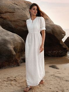 Discover the epitome of elegance with Isabella's white, casual A-line dress. Designed with a notched neckline, puff short sleeves, and a high-waisted flared hem, this versatile and fashionable piece is perfect for any occasion. Its non-stretch fabric ensures a comfortable, loose fit. Ideal for those seeking chic simplicity. SIZE + FIT Model is Wearing: S (UK8) Height: 175.0 / 68.9 Bust: 84.0 / 33.1 Waist: 60.0 / 23.6 Hips: 88.0 / 34.6 DETAILS + CARE Color: Solid White Style: Casual Pattern Type: White A-line Short Sleeve Dress For Spring, White V-neck Puff Sleeve Dress For Summer, Modest Short Sleeve Midi Dress For Beach, Modest Short-sleeve Dresses For Vacation, Modest Short Sleeve Dresses For Vacation, Summer Solid Color A-line Short Sleeve Dress, Solid Color V-neck Short Sleeve Summer Dress, Elegant Short Sleeve Puff Sleeve Dress For Spring, Solid Puff Sleeve Maxi Dress For Summer