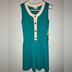 Vintage Nwt St John Sportswear Jade Sleeveless Sweater Dress Size 10 Wool Blend. (There Is A Small Hole On Front- See Photos. Repairable) New With Tags Vintage St. John Dry Clean Only Rayon Wool Blend Knee Length Jade/White 7665 Button Closure Stretch Pleated Gold/Jade Buttons Made In Usa More Than 100 Pieces Of Vintage St. John Separates And Sets Coming To My Store In Coming Weeks And Months. Some New With Tags. Continue To Visit For Amazing Pieces! Green Fitted Sleeveless Tennis Dress, Sleeveless Green Tennis Dress For Spring, Fitted Green Sleeveless Tennis Dress, Casual Green Tennis Dress For Spring, Sleeveless Tennis Dress, Casual Sleeveless Summer Tennis Dress, Casual Sleeveless Tennis Dress For Summer, Sporty Green Sleeveless Tennis Dress, White Sleeveless Tennis Dress