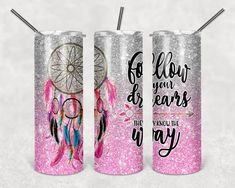 two tumbles with pink glitter and feathers on them