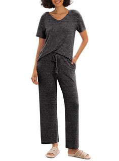 PRICES MAY VARY. Material: Our women's pajama sets are made of super comfy ribbed fabric, the 2 piece lounge set provides an exceptional level of comfort. This material is not only comfortable but allows you to relax in the most serene surroundings Features: The cozy Pjs sets have a unique v neck design and split at the hem of the top. Soft fabrics, short sleeves and long pants are designed to maximize home living comfort. Besides，pockets on either side of the pant make it easy to store small it 2 Piece Lounge Set, Cozy Pjs, Womens Pajama, Soft Pajamas, Satin Pyjama Set, Nightgowns For Women, Womens Pyjama Sets, Sleepwear Sets, Loungewear Set