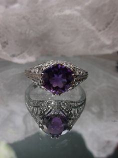 Excited to share the latest addition to my #etsy shop: 2ct Simulated Amethyst Art Deco Floral Sterling Silver Floral Filigree Ring Size (Made To Order) (Design #159) https://etsy.me/2WnMQjm #jewelry #ring #silver #no #whitegold #yes #girls #purple #amethyst Art Deco Floral, Filigree Ring, Solitaire Ring, Heart Ring, Ring Size, Amethyst, Art Deco, White Gold, Sterling Silver