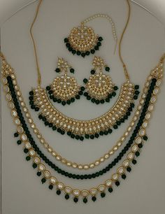 Kundan Jewelry Bridal Choker Necklace Earrings Tikka Set, Long Necklace Rani Haar Green Jewellery Set, Party Wear Necklace, Statement Set ITEM DESCRIPTION Metal        = Gold Plated Occasion  = Wedding, Party Wear, Bridal Color        =  Yellow and Yellow Size          = Necklace Length = 7 Inches Long, Earring Size = 3.5 Inches Long, tikka - 6 Inches Long Necklace Weight = 78 grams Earring Weight =  26 grams Long Necklace  = 13 Inches Long ( Adjustable String/Dori) Free Shipping Kundan Round Necklace For Parties, Temple Jewelry For Party With Round Shape, Kundan Bridal Necklace For Party, Green Dangle Bollywood Style Jewelry, Green Bollywood Style Dangle Jewelry, Temple Style Bridal Necklace For Party, Kundan Jewelry For Party, Kundan Round Jewelry For Parties, Heavy Round Kundan Necklace For Party