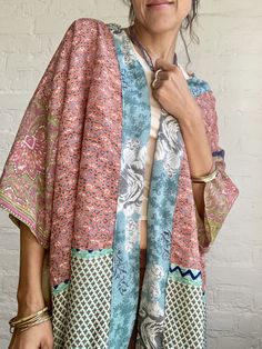 This is very light colourful silk kimono shirt,  made of different styles of saree silk unisex, made for both men and woman nice looking with skirt as well as trousers or shorts can be used all year round as a cover up on its own or layered over  great for summer festivals, holiday travels or every day very comfortable and soft, flowy material  fits size up to 14-16 UK Please visit also https://www.etsy.com/shop/AltheaStores? For more boho style ides Thank you for looking Funky Shirt, Colourful Party, Silk Patchwork, Funky Shirts, Kimono Blouse, Kimono Shirt, Over Coat, Summer Festivals, Saree Silk