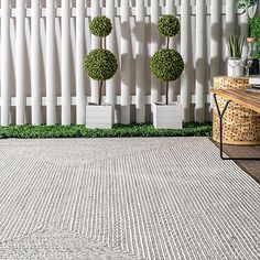 You’ll love the modern feel of this Ivory Braided Lefebvre Area Rug! No matter where it goes in your house, it will give your space an updated look while keeping it cozy. Rug measures 12 ft. in length x 15 ft. in height Crafted of 100% polypropylene Machine made construction Features a braided pattern Hues of ivory, black, and gray Rug pad not included Care: Spot clean only. Blot spills with a mild detergent and clean cloth. Not safe for outdoor use. This item is available at Kirklands.com only, not available in stores. Please note: this item cannot be shipped to APO/FPO addresses. | Braided Lefebvre Area Rug, 12x15, Ivory, 12x15 , Polypropylene | Kirkland's Home Porch Kitchen, Casual Braids, Modern Trellis, Living Room Patio, Simple Borders, Outdoor Runner Rug, Area Rug For Living Room, Oval Rugs, Natural Fiber Rugs