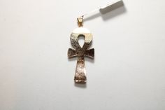 "Egyptian Ankh Cross Key of Life Turquoise 18K Yellow Gold Pendant 4.5Gr Weight Approximate : 4.5 Gr Height : 1.8\" = 48 mm Width : 0.7\" = 18 mm ✔ IT IS Tested & SIGNED WITH THE EGYPTIAN Gold Government HALLMARK FOR 18K GOLD to Ensure Authenticity. ✔ Lovely gift idea ABSOLUTELY GORGEOUS, LOOKS FABULOUS ON. ✔ 100% Egyptian handmade. ✔ Condition: A brand-new, exactly as on the photos. ★ GIFTS ✔ All items are packaged in a paper jewelry gift box, ready for gifting. ✔ If you are sending a gift Key Of Life Egyptian, Egyptian Gold, Egyptian Revival Jewelry, Key Of Life, Egyptian Ankh, Ankh Cross, Egyptian Scarab, Paper Jewelry, Yellow Gold Pendants