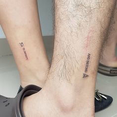 two people with small tattoos on their legs