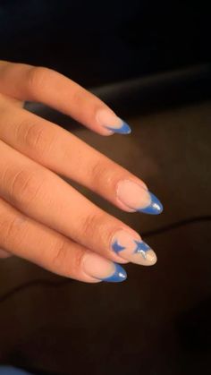 blue french tip gel nails w/silver lined stars Nails French With Design, Nails W Designs, Short Almond Winter Nails, Acrylics Simple, Blue Nails White French Tip, Fun French Tips Nails, French Tip Nails Blue And White, Cute Blue Acrylic Nail Ideas, Blue French Almond Nails