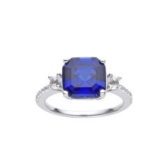 Presenting to you, 9x9mm Lab Grown Asscher Cut Blue Sapphire Ring, The captivating sapphire is surrounded by dazzling 16 Round white topaz accents, adding a touch of brilliance to its allure. A perfect blend of elegance and sophistication. The Asscher cut, known for its precise facets and distinct step-like pattern, creates an enchanting play of light, making this ring unique and eye-catching.    This Ring is meticulously crafted from 925 sterling silver, depicting both royalty and durability. W Blue Asscher Cut Cubic Zirconia Sapphire Ring, Blue Cubic Zirconia Sapphire Ring, Asscher Cut, Blue Cubic Zirconia Asscher Cut Sapphire Ring, Blue Topaz Ring With Asscher Cut Center Stone, Blue Sapphire Ring With Diamond Accents, Asscher Cut, Blue Asscher Cut Sapphire Ring With Diamond Accents, Asscher Cut Sapphire Ring With Cubic Zirconia Accents, Asscher Cut Lab-created Sapphire Ring With Accent Stones, Blue Asscher Cut Jewelry With Accent Stones