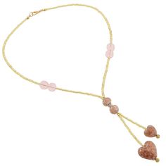 A statement of sophistication, elegance, and style, this Murano Heart Necklace is an instant hit with women of all ages and tastes. The handcrafted Murano Glass Tie necklace features two beautiful tender hearts in shades of creamy rose and pink sparkling with infused pieces of copper and suspended from strings of exquisite gold seed beads. The matching ball-shaped Murano Glass beads along with Swarovski crystals in the middle make a stylish accent. This necklace is a great expression of your lov Elegant Adjustable Double Heart Necklace, Elegant Pink Heart Necklace With Heart Beads, Elegant Pink Heart Necklace For Wedding, Pink Heart Beads Necklace For Wedding, Elegant Adjustable Pink Gold Necklace, Elegant Pink Gold Adjustable Necklace, Elegant Adjustable Pink Necklace, Elegant Pink Adjustable Necklace, Elegant Pink Heart Pendant Necklace