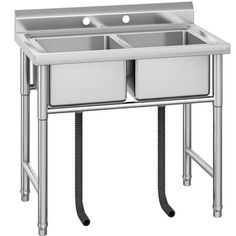 two compartment stainless steel kitchen sink with drainer and faucet, on legs