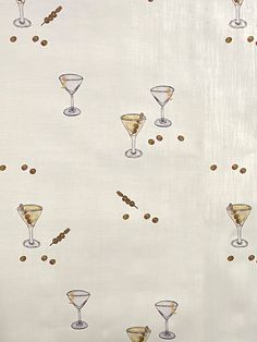 an image of martinis and coffee beans on a white background wallpaper design with gold confetti