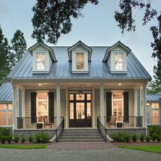 a large house with lots of windows in the front