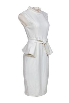 Sophisticated ivory dress in a figure flattering peplum silhouette. Take this dress to the next level by accessorizing it with a pair of dazzling statement earrings! Size 6 Shell: 63% Polyester, 33% Viscose, 4% Elastane Lining: 100% Polyester Stand collar neckline Concealed back seam zipper closure Sheath silhouette Sleeveless Peplum detail Bust 31" Waist 28" Shoulder to hem 43" Chic Peplum Cocktail Dress, Elegant Off-white Dress For Work, Elegant Off White Dress For Work, Chic Peplum Midi Dress For Work, Elegant Peplum Midi Dress For Party, Elegant Fitted Peplum Dress, Elegant Off White Ruffled Dresses, Chic Peplum Dress For Formal Occasions, Elegant Formal Peplum Midi Dress