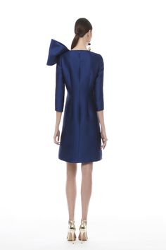 Looking for a unique and eye-catching dress? The Frascara 4334 is perfect for making a statement. It features a 3/4 sleeve dress bodice with draped ruffled bow detail, an A-line skirt silhouette, and a hidden back zipper. Plus, it's lined with satin for a luxurious look and feel. Chic Formal Mini Dress With Satin Bow, Elegant Mini Dress With Satin Bow For Spring, Elegant Spring Dress With Satin Bow, Elegant Mini Dress With Bow, Elegant Boat Neck Dress For Gala, Luxury Party Dresses With Bow Detail, Elegant Boat Neck Gala Dress, Elegant Blue Mini Dress With Bow, Elegant Evening Mini Dress With Bow