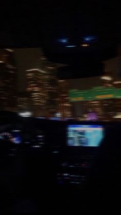 a blurry photo of a city at night