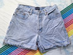 "Looking for the perfect pair of distressed/destroyed shorts this summer? Check out these absolutely THRASHED vintage Gap light wash cuff jean shorts from the late 80s/early 90s! Don't settle for fake rips/distressing, get the GENUINE vintage destruction that only these SICK shorts can offer! RADICAL! 100% Cotton, Made in Mexico Condition: Extremely rough condition - see pics! Major flaws include a tear near the bottom of the fly, holes above the back pockets, brown staining between the back poc Late 80s, Don't Settle, Early 90s, The Fly, Short Outfits, Perfect Pair, Jean Shorts, Denim Shorts, Cuff