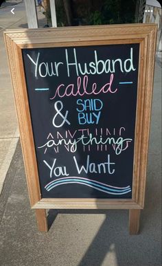 a chalkboard sign that says your husband called & said and buy anything you want