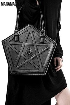 The Perfect Gothic Style Accessory If you're looking to complete your gothic look, a handmade Dark Gothic Handbag is just what you need. Made with high-quality materials and designed with attention to detail, these handbags are the perfect addition to your fashion accessory collection. With a unique gothic style, these handbags will add an extra edge to any outfit. Our Dark Gothic Handbags are handmade by skilled artisans, ensuring that each piece is one-of-a-kind. Made with high-quality materia Goth Bag, Gothic Bag, Tas Bahu, Statement Handbag, Star Chain, Dark Gothic, Vegan Leather Bag, Bag Collection